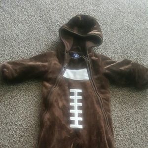 Children place snow suits